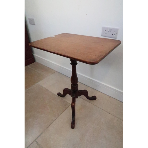 625 - A tilt top wine table on tripod supports