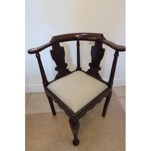 636 - A 19th century mahogany corner chair with urn shaped splats drop in seat with shaped apron below, fr... 