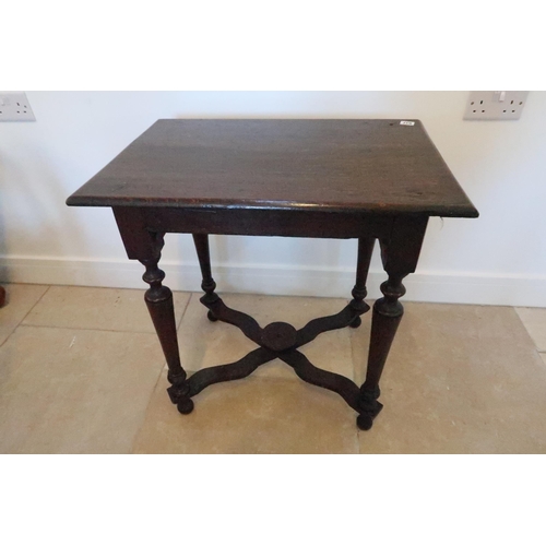 637 - An 18th century oak hall table with single drawer over shaped apron, turned supports joined by X str... 