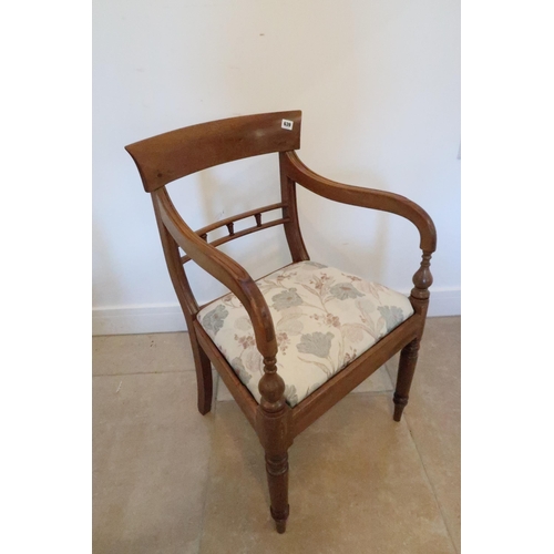 639 - A mahogany scroll arm desk chair