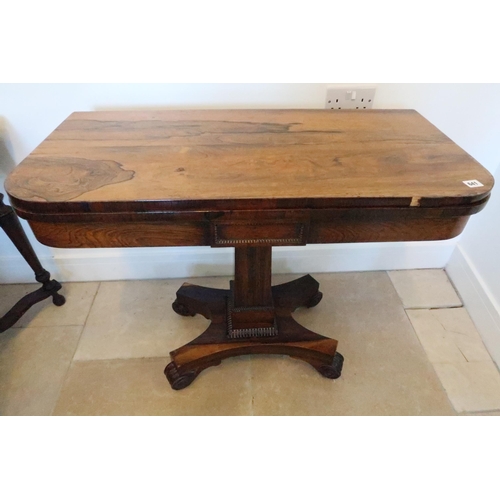 641 - A 19th century rosewood veneered card table, folding swivel top over single column support terminati... 