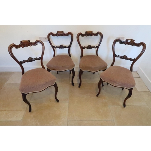 642 - A set of four walnut 19th century dining chairs, carved splat over overstuffed seat raised on cabrio... 