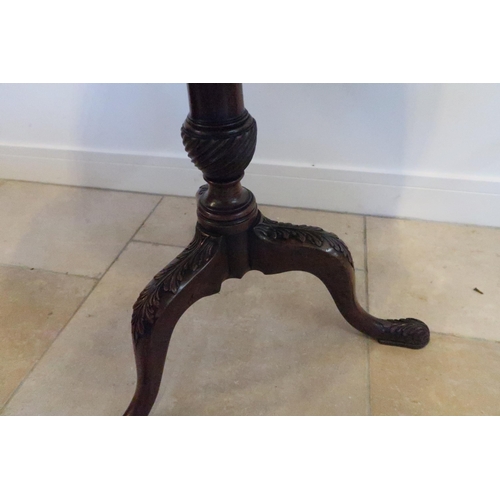 644 - A good quality 19th century mahogany tripod table with a Wythern stem and three carved legs, dished ... 