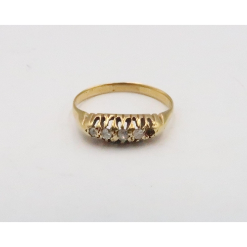 67 - 18ct gold diamond five stone ring. Size N. One stone missing. Weight 2.11 grams