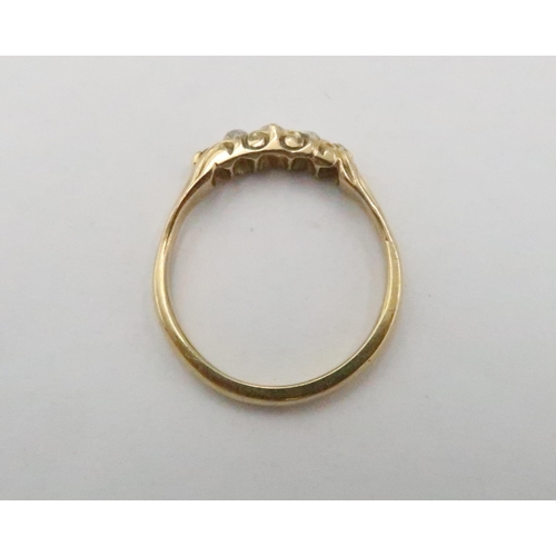 68 - An old cut diamond graduated five stone ring. Estimated 0.40ct. Size Q. Tests gold 18ct. Weight 3.37... 