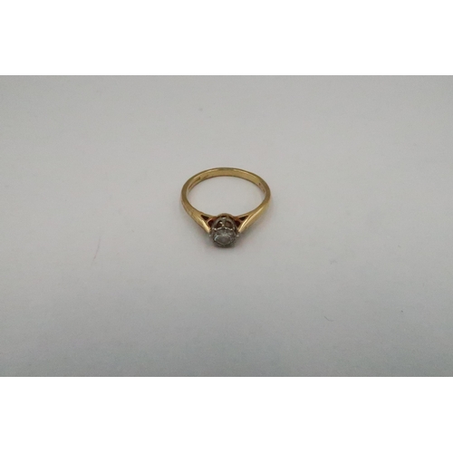 72 - An 18ct marked yellow gold solitaire ring with moissanite to shoulder - approx weight 3.3 grams - ri... 