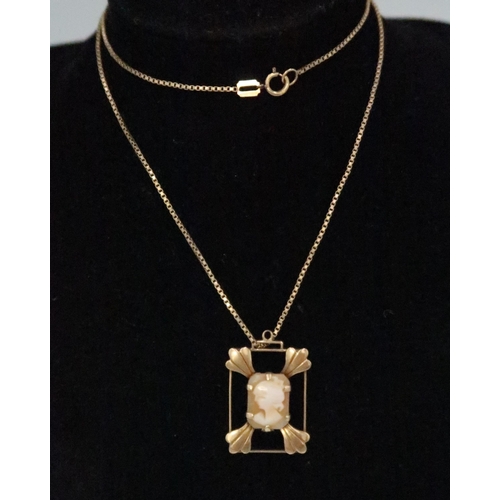 77 - A 9ct gold openwork cameo pendant, length 26mm. Suspended from a 9ct gold box link chain. Weight 4.8... 