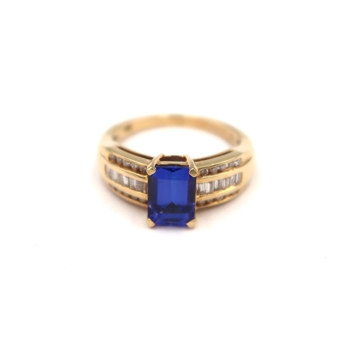 97 - An 18ct yellow gold tanzanite and diamond ring - tanzanite is approx 1.75ct and a very good colour, ... 