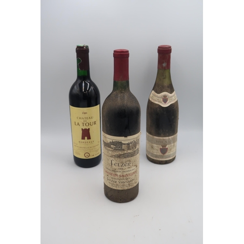 528 - A 1983 75cl bottle of Volnay, A 1990 Chateau De La Tour and a 1978 Fetzer.