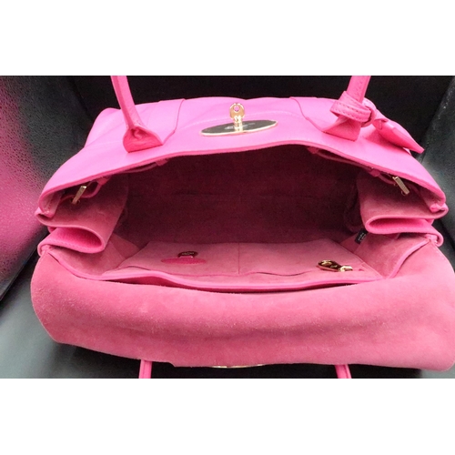 450 - A Mulberry Bayswater handbag, Fuscia pink with gold  coloured hardware - in brand new condition with... 