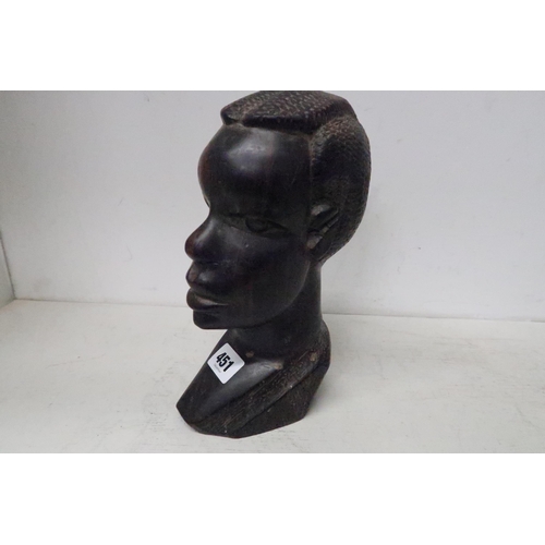 451 - A carved hardwood African tribal head - Height 24cm