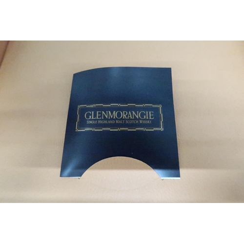 542 - A boxed presentation case of Glenmorangie, 70cl single malt whiskey, 10 years old, and two 5cl minia... 