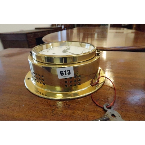 613 - A ship's clock, brass cased, dog watch strike, Arabic numerals, circa 1980.