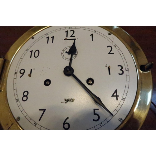 613 - A ship's clock, brass cased, dog watch strike, Arabic numerals, circa 1980.