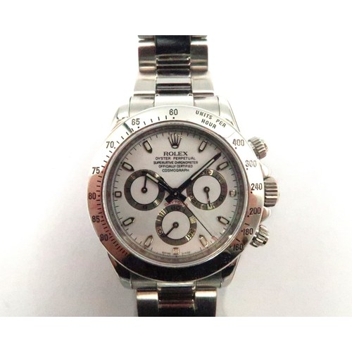 259 - A Rolex Daytona wristwatch - serial number 2 627 885 with box and papers dated 05/06/2007 and a serv... 