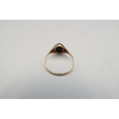 120 - A 9ct Yellow Gold Onyx Ring, Head Size approx. 9mm x 8mm, Ring Size approx. N