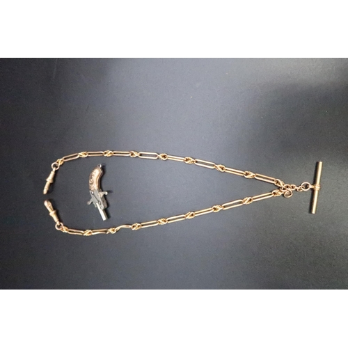 125 - A 9ct gold fancy link Albert chain with T bar, 14.6g, 39cm long and a miniature percussion pistol ch... 