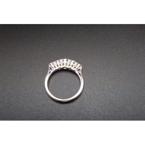 132 - An 18ct white gold old cut diamond five stone ring. Estimated total diamond weight 0.75ct, I/J colou... 