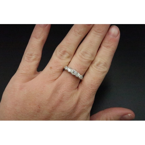 132 - An 18ct white gold old cut diamond five stone ring. Estimated total diamond weight 0.75ct, I/J colou... 