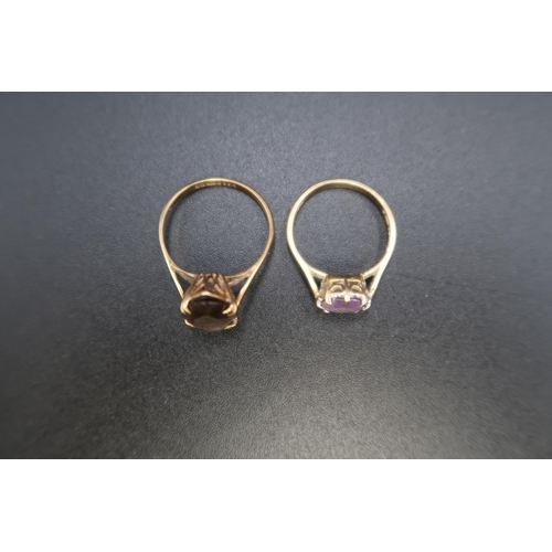 150 - Two 9ct gold dress rings. One set with a marquise shape smokey quartz, size Q 1/2. One set with a ci... 