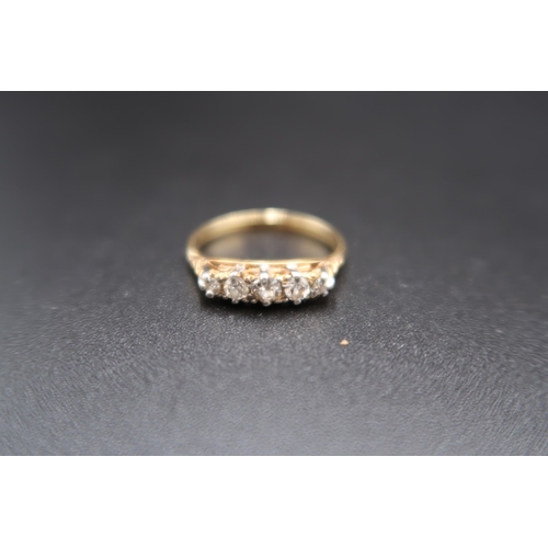 154 - A graduated old cut diamond five stone ring. Stamped 18ct. Size N. Weight 2.88 grams