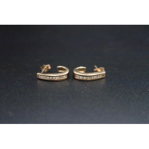 156 - A pair of 9ct gold brilliant cut diamond ear cuffs. Weight 3.68 grams.