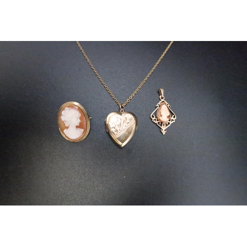 159 - A 9ct gold heart shape photo locket suspended from a gold plated chain 4.95 grams. A 9ct gold cameo ... 