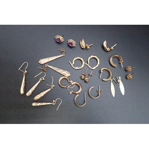 163 - An assortment of twelve pairs of earrings. Tested as or with marks indicating 9ct gold. Weight 12.06... 