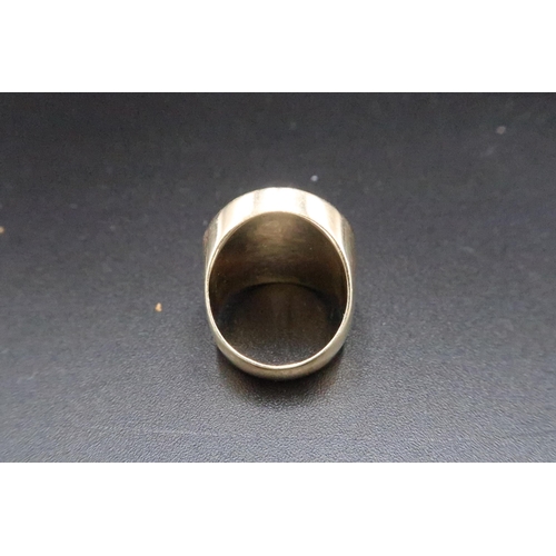 166 - A coin ring. Tests 14 and 22ct gold. Size K. Weight 10.45 grams