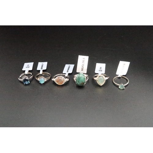 171 - A group of six silver gem set rings to include moonstone,topaz, aquaprase and Santa Terezinha Emeral... 