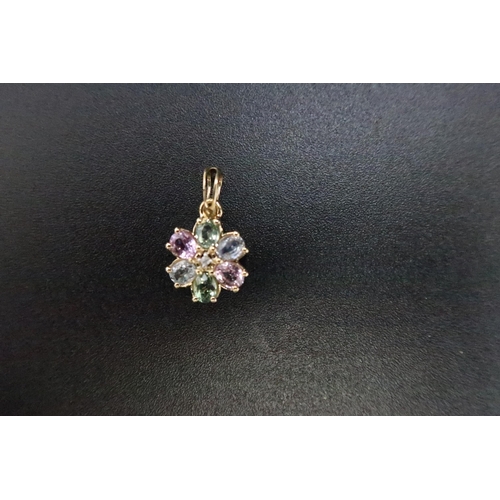 187 - A 9ct gold rainbow sapphire and diamond flower cluster pendant. Weight 1.27 grams