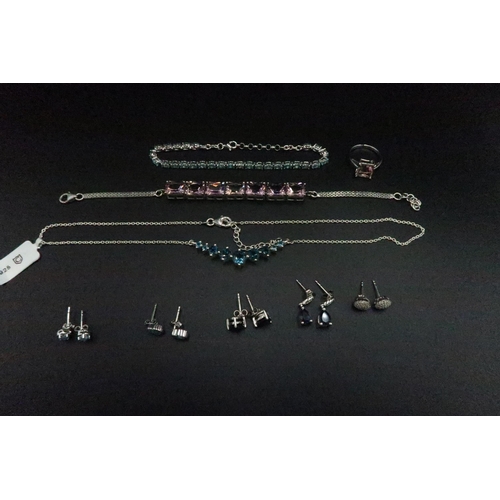 192 - group of silver jewellery to include a blue zircon line bracelet. A graduated topaz necklet. Two pai... 