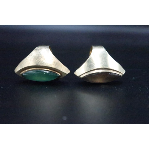 203 - Two marquise shape gem set dress rings. Size S and Q. Stamped 585. Weight 15.74 grams.