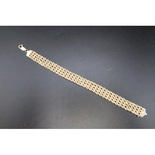 206 - A three row rope twist bracelet. Stamped 10K. Weight 6.84 grams