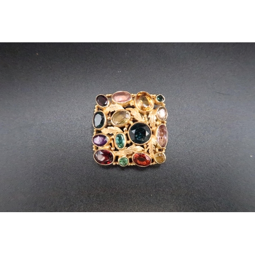 207 - A Tutti Frutti multi gem set square panel brooch. 30mm. Stamped 750. Weight 14.55 grams