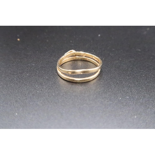 208 - A double band snake ring. Size R. Stamped 585. Weight 2.77 grams.