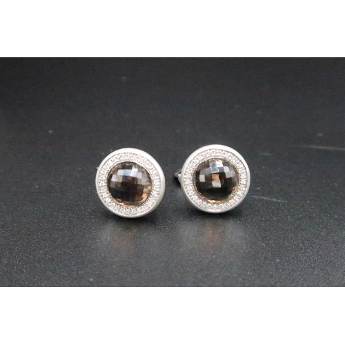 212 - A pair of 14ct white gold diamond and quartz cufflinks - approx total weight 16.2 grams - in very go... 