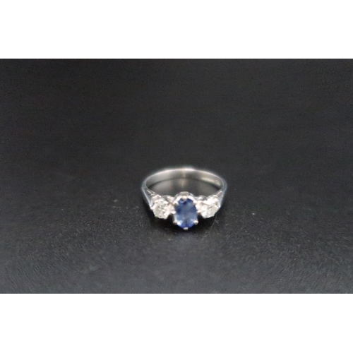 225 - An 18ct white gold diamond and sapphire three stone ring size M - weight approx 2.8 grams