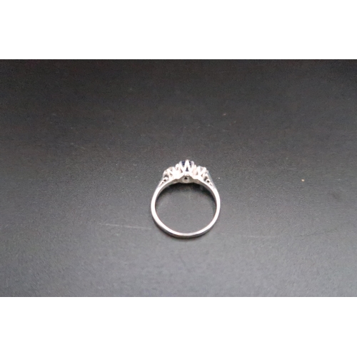 225 - An 18ct white gold diamond and sapphire three stone ring size M - weight approx 2.8 grams