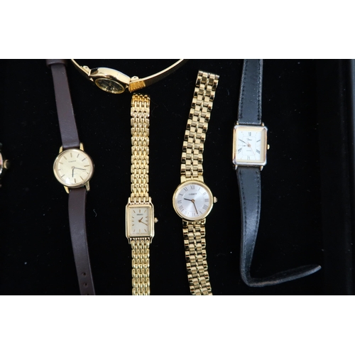 322 - A large group of costume watches including a Philip Mercier quartz example and a Radley watch.