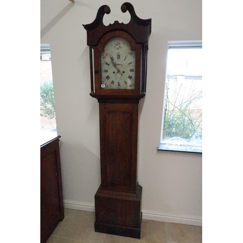 591 - An 8 day longcase clock with a painted arched dial signed Bradley Ilkistone in an oak and mahogany c... 