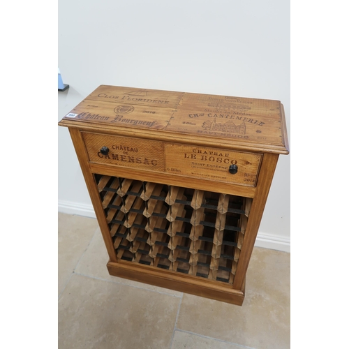 602 - A pine 28 bottle wine rack, 70cm wide x 94cm high