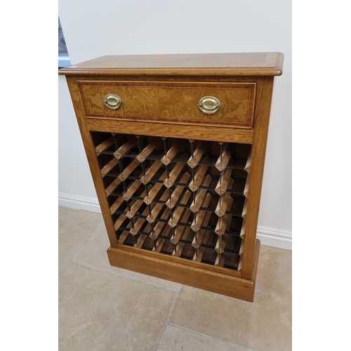 604 - An oak 36 bottle wine rack, 70cm wide x 94cm high