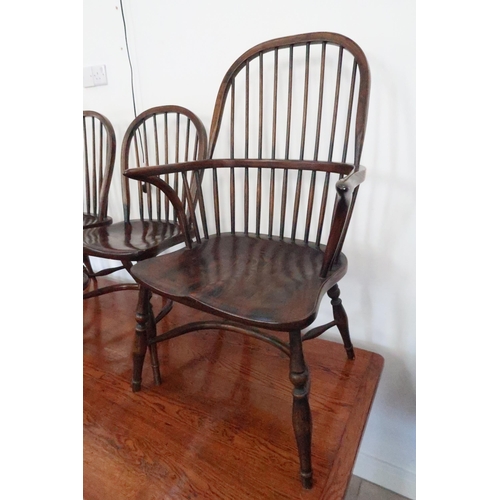 617 - An oak refectory table - 220cm x 85cm - and six Windsor chairs including two carvers