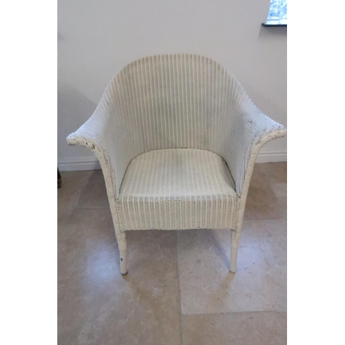 690 - A Lloyd Loom armchair