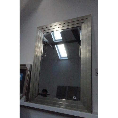 693 - A modern painted mirror with bevelled edged glass - 114cm x 84cm