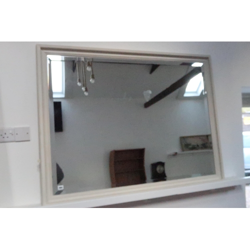 694 - A modern painted mirror with bevelled edged glass - 130cm x 100cm