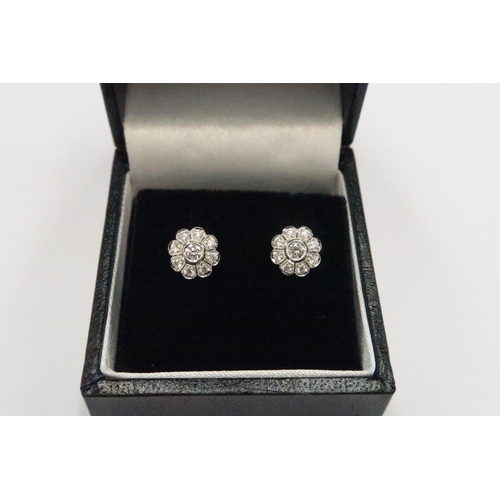 9 - A pair of good quality 18ct White Gold Flower Cluster Diamond Ear Rings, Head Size approx. 8mm Diame... 