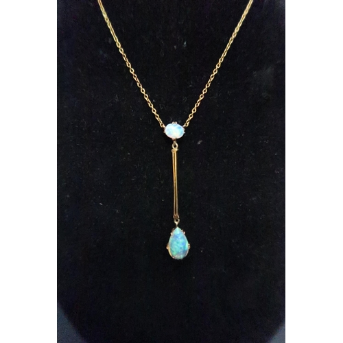 234 - A pretty 14ct (tested) opal set drop pendant on a stamped 9ct yellow gold chain - approx total weigh... 