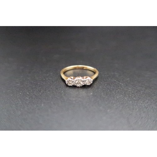 223 - An 18ct gold (hallmarked) three stone diamond illusion set ring size J/K - weight approx 2.1 grams